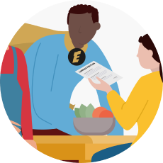 image of two people looking at a paper